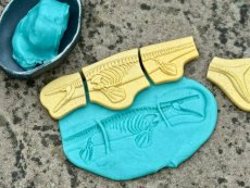 Yellow Door | kostry Pliosaur & Stegosaurus