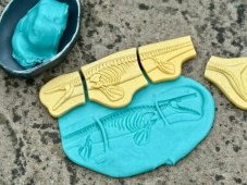 Yellow Door | kostry Pliosaur & Stegosaurus